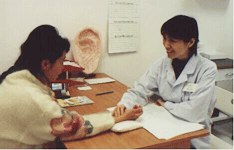 Dr. Jane Fan with patient